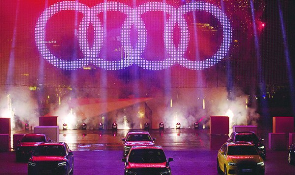 Audi AG vehicles stands onstage during a world premiere event in Shenzhen, China, on Tuesday, June 5, 2018. Audi plans to make five new-energy vehicle models in China by 2022, the companys China head Joachim Wedler said. Photographer: Giulia Marchi/Bloomberg via Getty Images