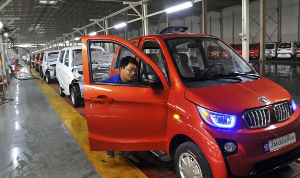 An employee assembles an electric car along a production line at a factory in Qingzhou, Shandong province, China, October 31, 2015. China's factory activity fell for an eighth straight month in October but at a slower pace as export orders flickered into life, a private survey showed on Monday. Picture taken October 31, 2015. REUTERS/China Daily CHINA OUT. NO COMMERCIAL OR EDITORIAL SALES IN CHINA