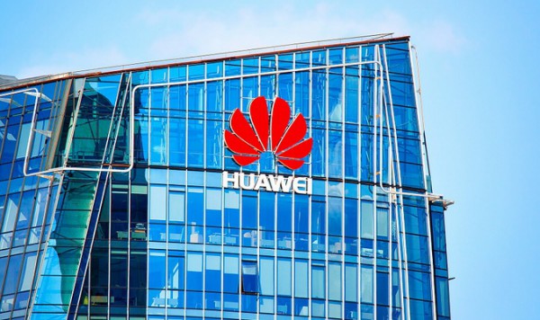 Vilnius, Lithuania - August 8, 2017: Huawei Technologies company headquarter in the modern office building skyscraper in the business district of Vilnius, Lithuania.
