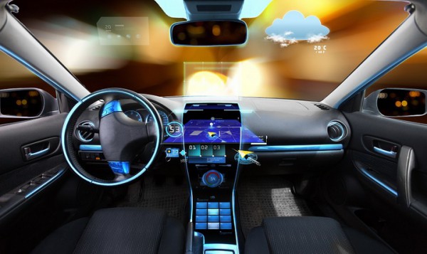 transport, destination and modern technology concept - car salon with navigation system on dashboard and meteo sensor on windshield over night lights background